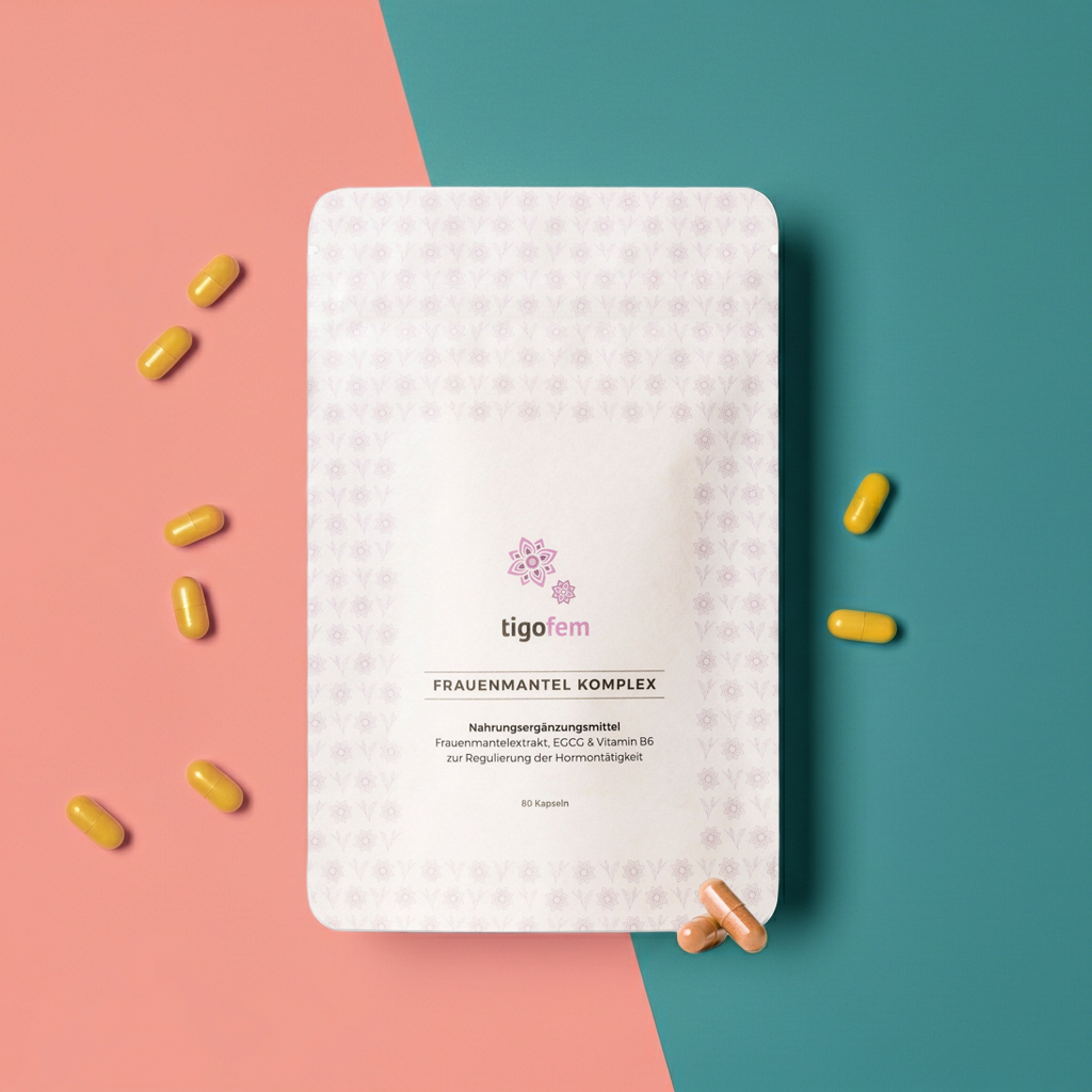 Tigofem Frauenmantel-Komplex Refill-Beutel mit 80 Kapseln für Hormonregulierung auf zweifarbigem Hintergrund.